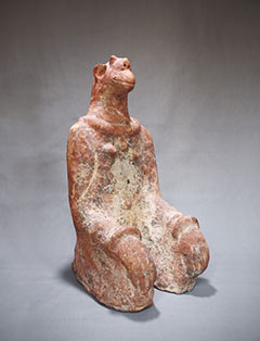 image of clay statue called caravans of gold - seated