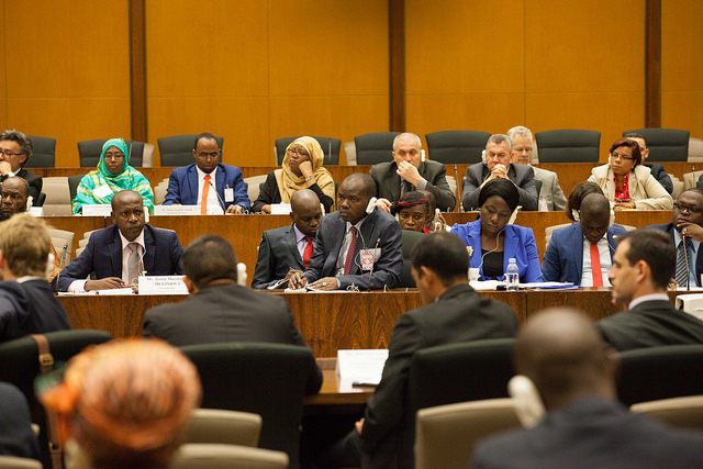 Group of people in a large meeting room