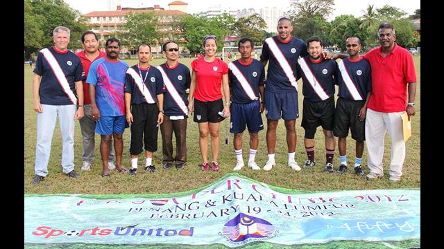 Tony Sanneh, Danielle Slaton and Ambassador Jones join Malaysian soccer coaches after a day of sessions and training clinics.