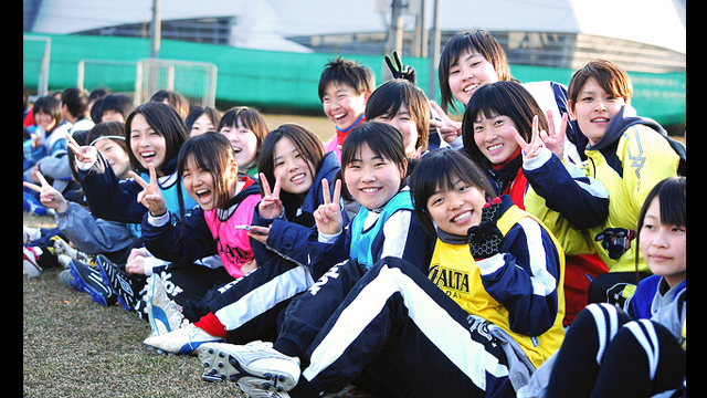 Young Japanese players watch the U.S. Women's National Soccer team practice at the Izumi Soccer Field in Sendai, Japan.