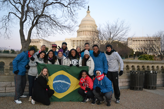Thr group poses in front of the Capitol Building.