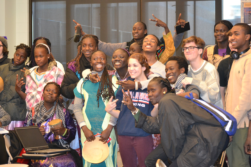 The Senegalese girls demonstrate their drumming skills at a high school music class.
