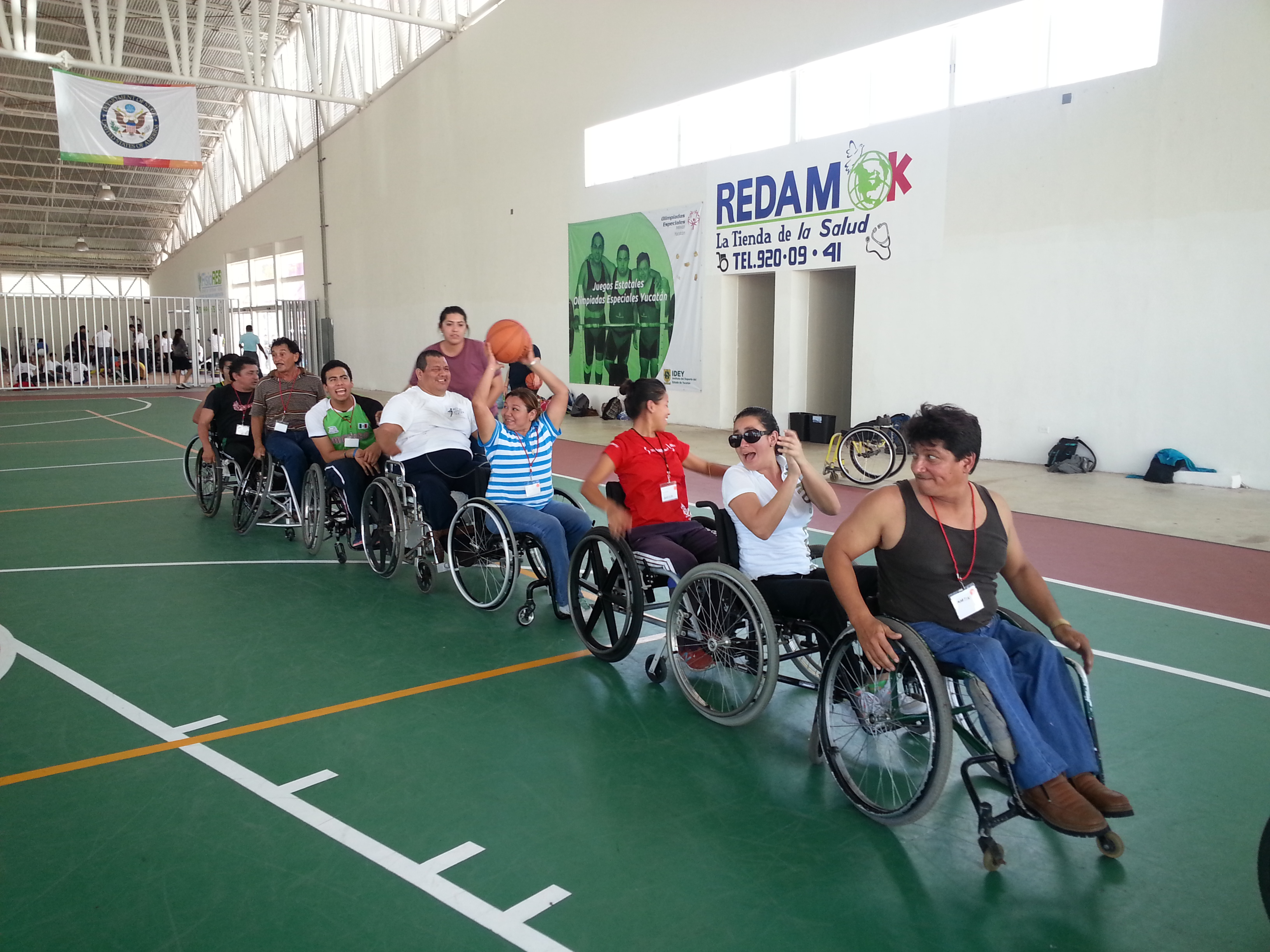 Coaches learning an exercise to use with their athletes