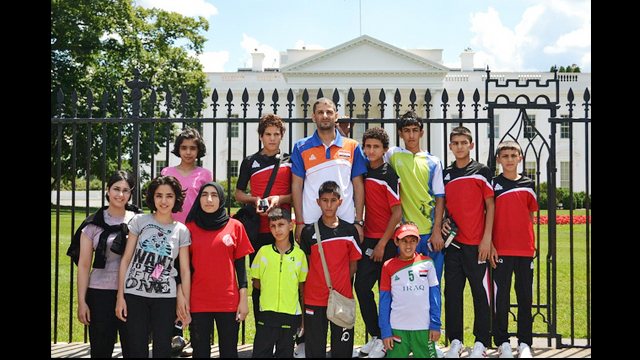 The Iraqi delegation takes a group photo at the White House during their afternoon of D.C. touring.