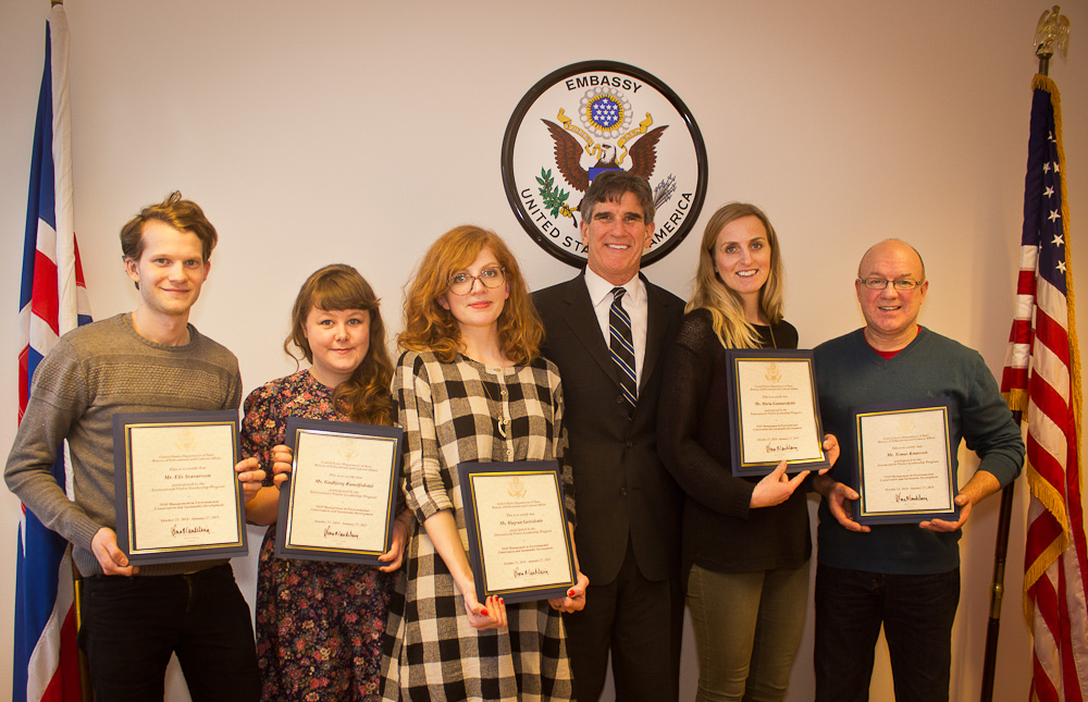 Group photo of participants holding certificates