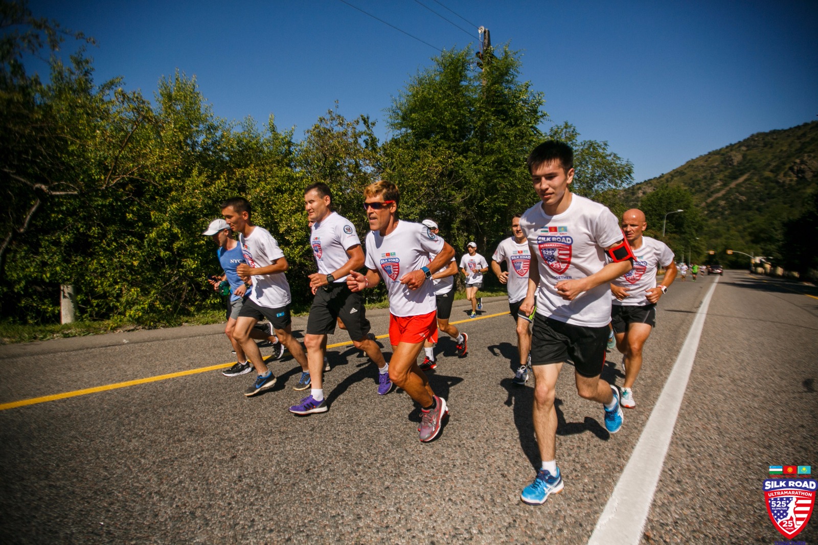 Dean running with a group of runners