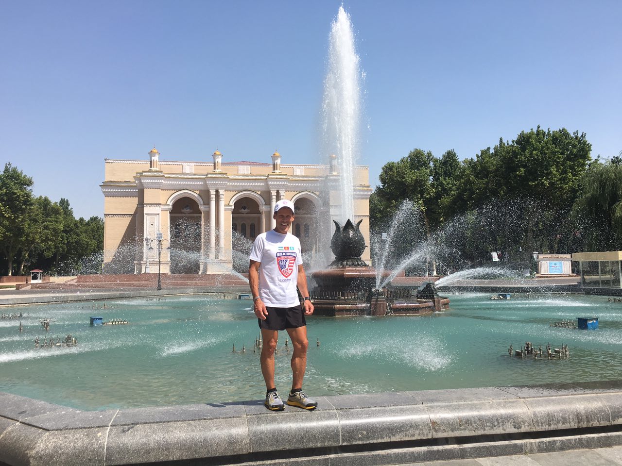 Dean Karnazes in front of a historic opera house.
