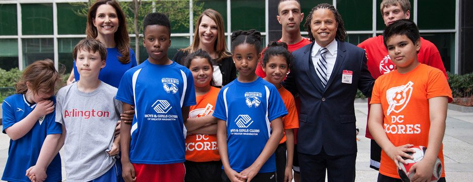 Cobi Jones and Evan Ryan with DC youth