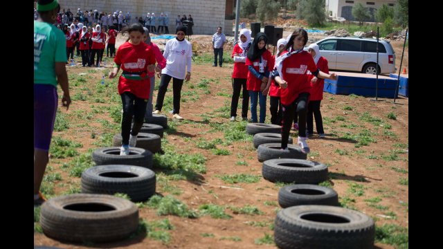 The participants are so enthused for the drills,  that they readily take on the tires to help prepare