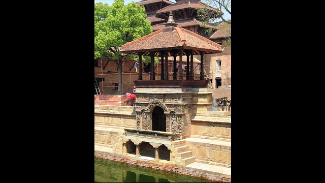 Mahadev Temple, Kathmandu Durbar Square, Nepal: This carved window frame in the temple's upper wall is an architectural tradition of the Kathmandu Valley.