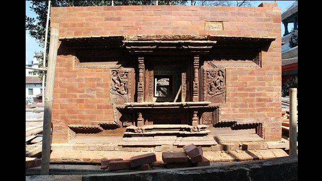 Mahadev Temple, Kathmandu Durbar Square, Nepal: This carved window frame in the temple's upper wall is an architectural tradition of the Kathmandu Valley.