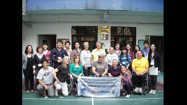 The U.S. group, hosts, and 2011 Mobility International USA alumni gather at the Guangdong Peiying Vocational Tech School in China.