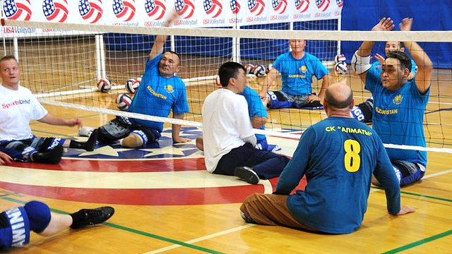 Kazakhstan sitting volleyball athletes go through their first training session with the U.S. Women's national team coach Bill Hamiter.