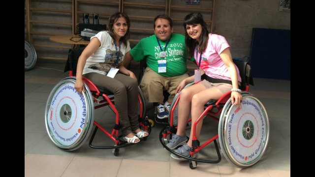 Armenian participants who will visit the U.S. in September 2014 experience sport-wheelchairs with an American participant.