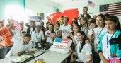 Dean holding a 4th of July cake